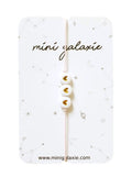 Bracelet cordon enfant cœurs dorés - mini galaxie