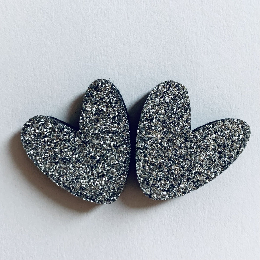 Pin's enfant cœurs à partager doré – les petites hirondelles